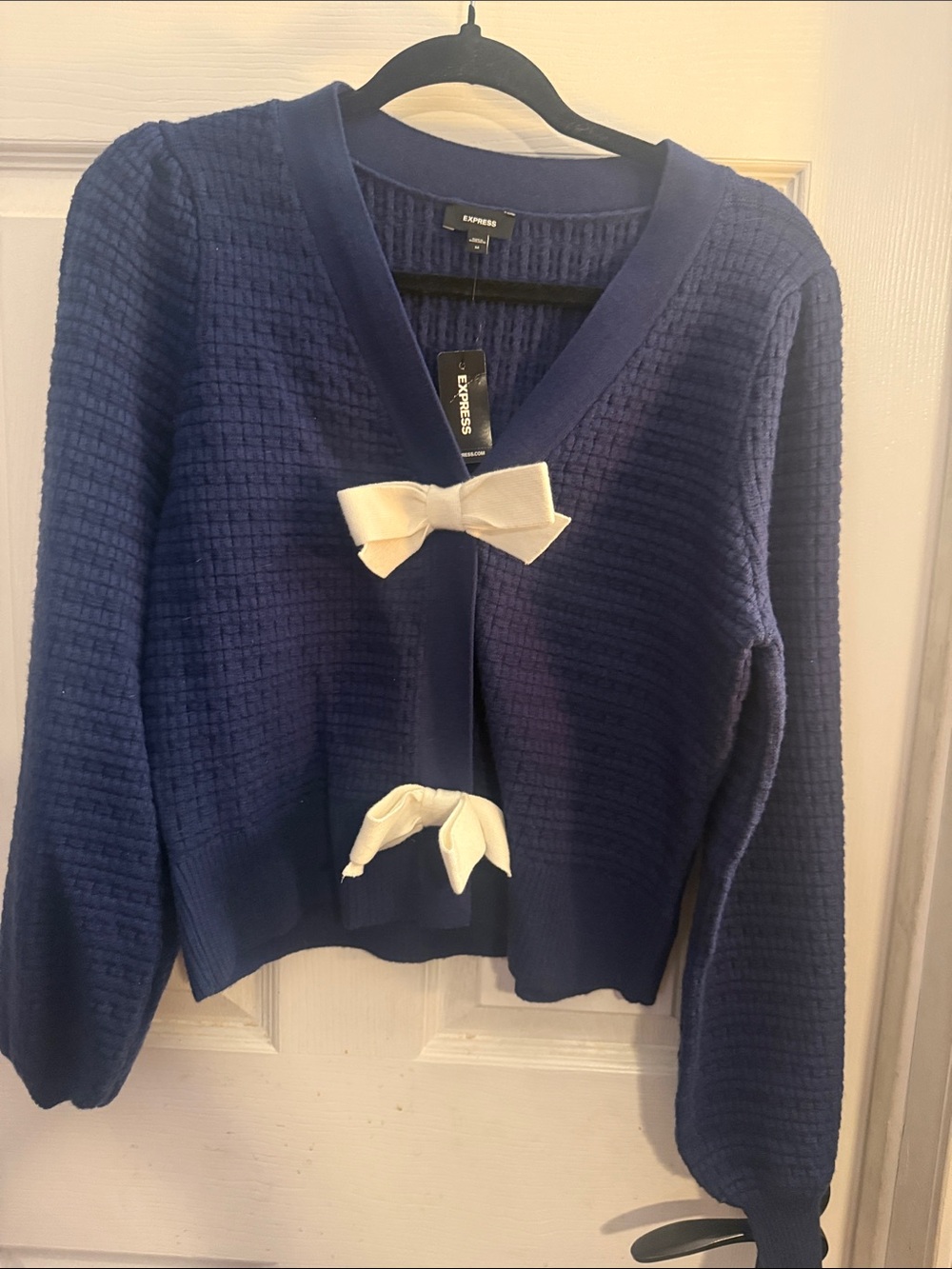 Express Navy Cardigan with Cream Bow Accents